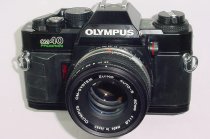 Olympus OM40 Program 35mm Film Camera with Olympus 50mm F/1.8 Zuiko Lens