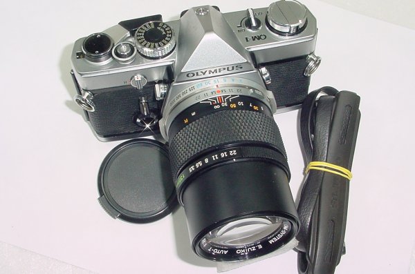 Olympus OM-1 35mm Film SLR Manual Camera with Olympus 135mm f/3.5 Zuiko Lens