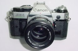 Canon AE-1 Program 35mm SLR Film Manual Camera with Canon 50mm F/1.4 FD Lens