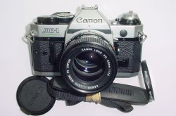 Canon AE-1 Program 35mm SLR Film Manual Camera with Canon 50mm F/1.4 FD Lens