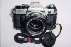 Canon AE-1 Program 35mm SLR Film Manual Camera with Canon 50mm F/1.4 FD Lens