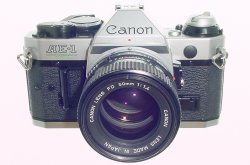 Canon AE-1 Program 35mm SLR Film Manual Camera with Canon 50mm F/1.4 FD Lens