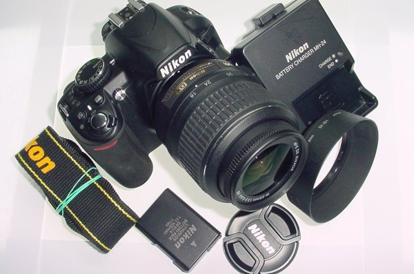 Nikon D3100 14.2MP Digital SLR Camera + Nikon 18-55mm F/3.5-5.6 GII DX Zoom Lens