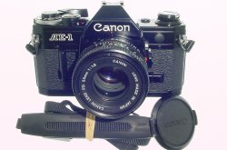 Canon AE-1 35mm Film Manual SLR Camera with 50mm F/1.8 FD Lens in Black