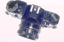 Canon AE-1 35mm Film Manual SLR Camera with 50mm F/1.8 FD Lens in Black