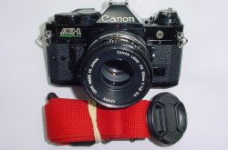 Canon AE-1 Program 35mm SLR Film Manual Camera + Canon 50/1.8 FD Lens in Black