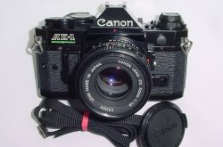 Canon AE-1 Program 35mm SLR Film Manual Camera + Canon 50/1.8 FD Lens in Black