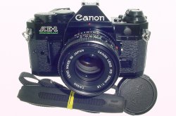 Canon AE-1 Program 35mm SLR Film Manual Camera + Canon 50/1.8 FD Lens in Black