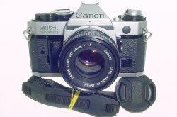Canon AE-1 Program 35mm SLR Film Manual Camera + Canon 50/1.8 FD Lens