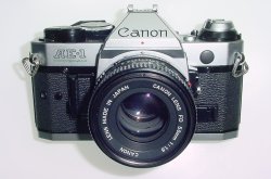 Canon AE-1 Program 35mm SLR Film Manual Camera + Canon 50mm F/1.8 FD Lens
