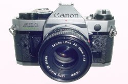 Canon AE-1 Program 35mm SLR Film Manual Camera + Canon 50mm F/1.8 FD Lens