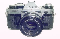 Canon AE-1 Program 35mm SLR Film Manual Camera + Canon 50mm F/1.8 FD Lens