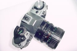 Canon AE-1 Program 35mm Film SLR Camera + Canon 35-70mm f/3.5-4.5 FD Zoom Lens