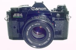 Canon AE-1 Program 35mm SLR Film Manual Camera + Canon 50/1.8 FD Lens in Black
