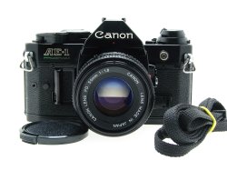 Canon AE-1 Program 35mm SLR Film Manual Camera + Canon 50/1.8 FD Lens in Black