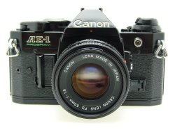 Canon AE-1 Program 35mm SLR Film Manual Camera + Canon 50/1.8 FD Lens in Black