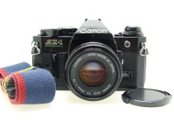 Canon AE-1 Program 35mm SLR Film Manual Camera + Canon 50/1.8 FD Lens in Black
