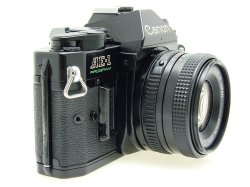 Canon AE-1 Program 35mm SLR Film Manual Camera + Canon 50/1.8 FD Lens in Black