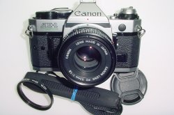 Canon AE-1 Program 35mm SLR Film Manual Camera + Canon 50mm F/1.8 FD S.C. Lens
