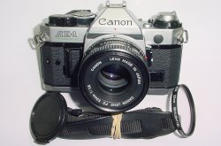 Canon AE-1 Program 35mm SLR Film Manual Camera with Canon 50mm F/1.8 FD Lens