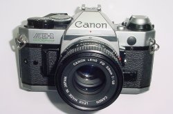 Canon AE-1 Program 35mm SLR Film Manual Camera with Canon 50mm F/1.8 FD Lens