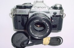 Canon AE-1 Program 35mm SLR Film Manual Camera with Canon 50mm F/1.8 FD Lens