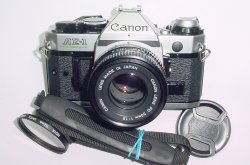 Canon AE-1 Program 35mm SLR Film Manual Camera with Canon 50mm F/1.8 FD Lens