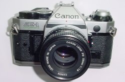 Canon AE-1 Program 35mm SLR Film Manual Camera with Canon 50mm F/1.8 FD Lens