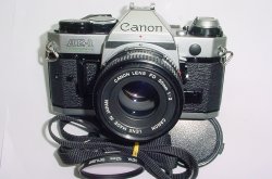 Canon AE-1 Program 35mm SLR Film Manual Camera with Canon 50mm F/1.8 FD Lens