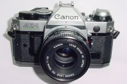 Canon AE-1 Program 35mm SLR Film Manual Camera with Canon 50mm F/1.8 FD Lens