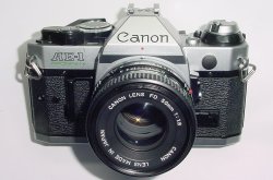 Canon AE-1 Program 35mm SLR Film Manual Camera with Canon 50mm F/1.8 FD Lens