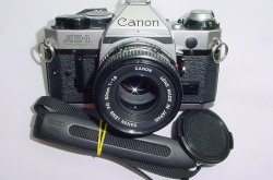 Canon AE-1 Program 35mm SLR Film Manual Camera with Canon 50mm F/1.8 FD Lens