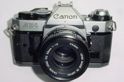 Canon AE-1 Program 35mm SLR Film Manual Camera with Canon 50mm F/1.8 FD Lens