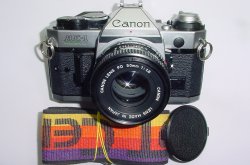 Canon AE-1 Program 35mm SLR Film Manual Camera with Canon 50mm F/1.8 FD Lens