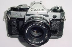 Canon AE-1 Program 35mm SLR Film Manual Camera with Canon 50mm F/1.8 FD Lens