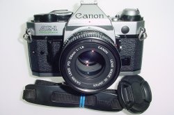 Canon AE-1 Program 35mm SLR Film Manual Camera with Canon 50mm F/1.8 FD Lens