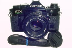 Canon AE-1 Program 35mm SLR Film Manual Camera with Canon 50mm F/1.8 FD Lens