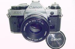 Canon AE-1 Program 35mm SLR Film Manual Camera with Canon 50mm F/1.8 FD Lens