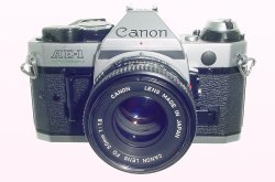 Canon AE-1 Program 35mm SLR Film Manual Camera with Canon 50mm F/1.8 FD Lens