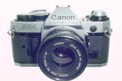 Canon AE-1 Program 35mm SLR Film Manual Camera with Canon 50mm F/1.8 FD Lens