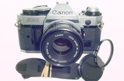 Canon AE-1 Program 35mm SLR Film Manual Camera with Canon 50mm F/1.8 FD Lens