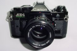Canon AE-1 Program 35mm SLR Film Manual Camera + Canon 50/1.4 FD Lens Excellent
