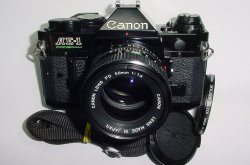 Canon AE-1 Program 35mm SLR Film Manual Camera + Canon 50/1.4 FD Lens Excellent