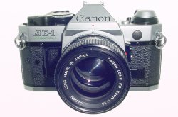 Canon AE-1 Program 35mm SLR Film Manual Camera + Canon 50/1.4 FD Lens