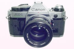 Canon AE-1 Program 35mm SLR Film Manual Camera + Canon 50/1.4 FD Lens