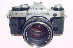 Canon AE-1 Program 35mm SLR Film Manual Camera + Canon 50/1.4 FD Lens