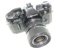 Canon AE-1 35mm SLR Film Manual Camera with 35-70mm F/3.5-4.5 FD Zoom Lens