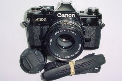 Canon AE-1 35mm Film Manual SLR Camera + Canon 50/1.8 FD Lens