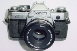 Canon AE-1 35mm Film Manual SLR Camera + Canon 50/1.8 FD Lens