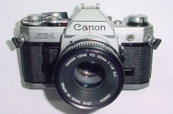 Canon AE-1 35mm Film Manual SLR Camera + Canon 50/1.8 FD Lens
